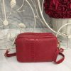 Bolso rojo, imitación cocodrilo personalizado con iniciales bordadas en Laredo